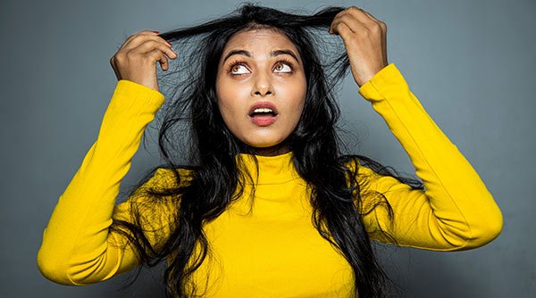 6 Causes Of Frizzy Hair