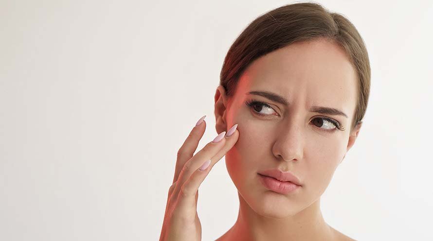 what causes dark spots on face